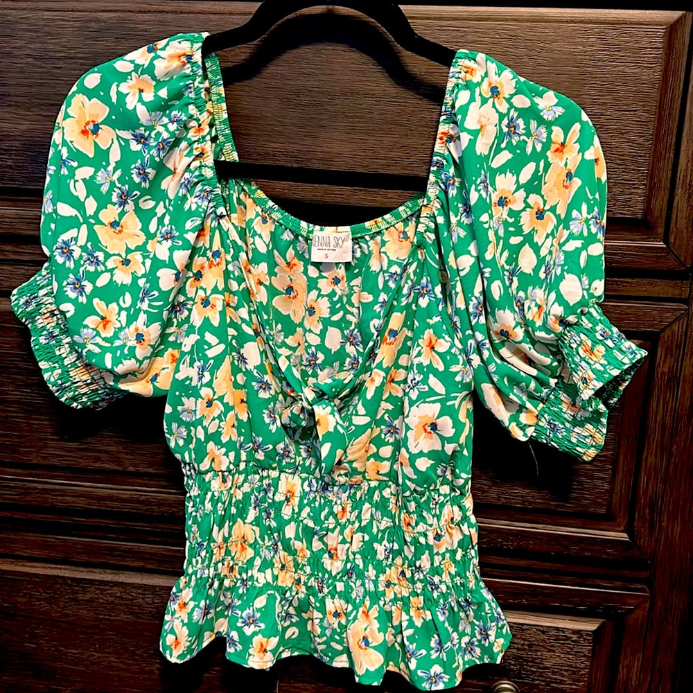 Sienna Sky Peplum Top. Size Small.